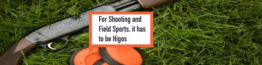 Shooting club rifle and orange clay pigeons with banner ‘For Shooting and Field Sports, it has to be Higos’